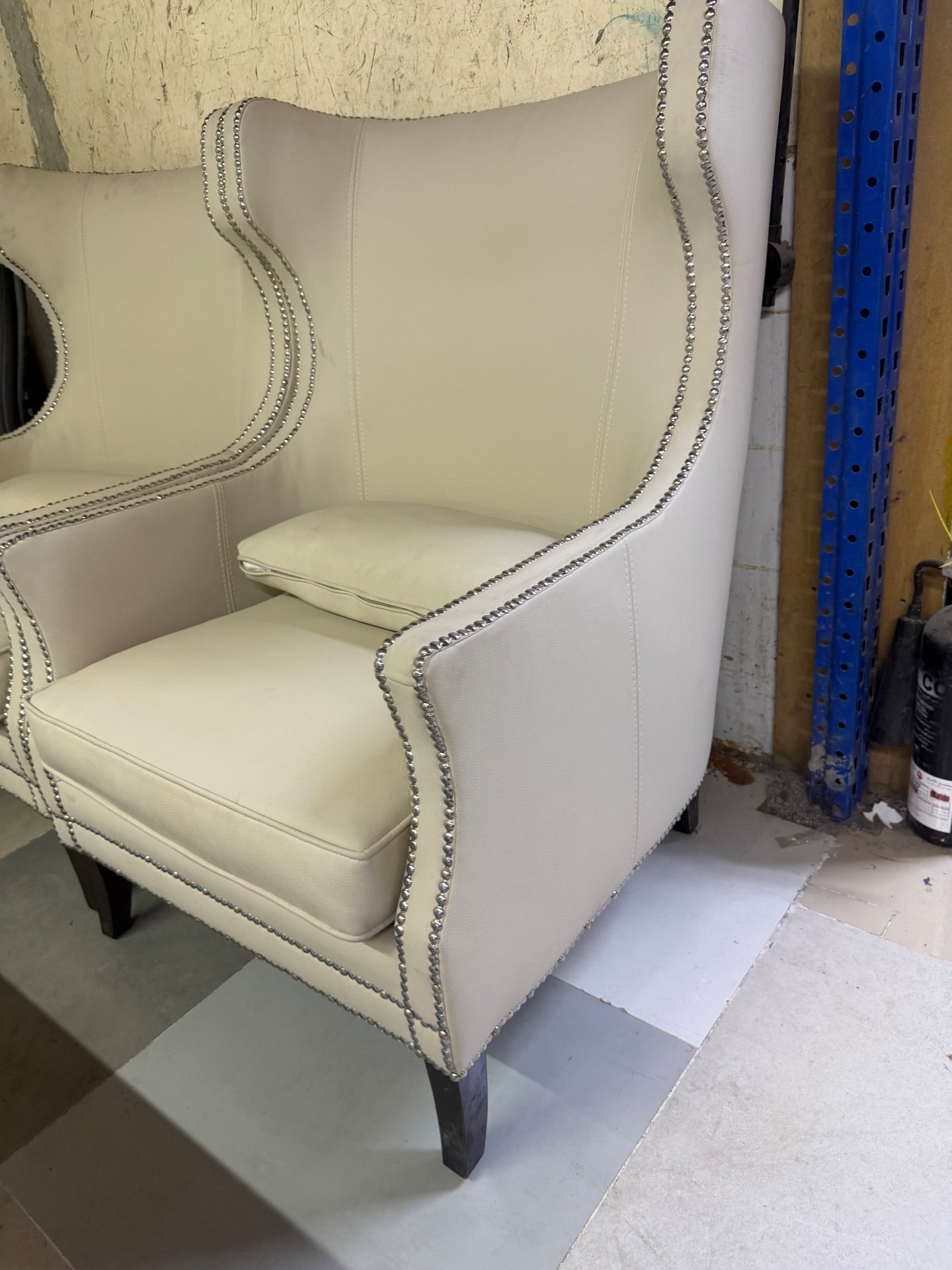 2XL Furniture & Home Decor Pair of Off-White Studded Wingback Armchairs - Like New